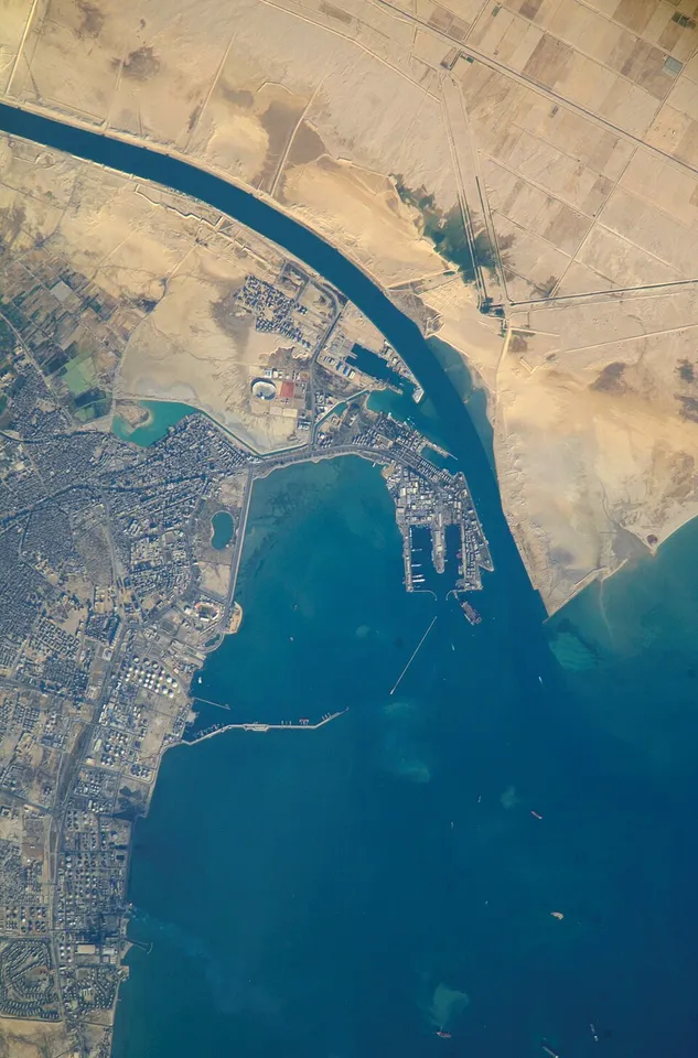Context: The port and city of Suez seen from space.