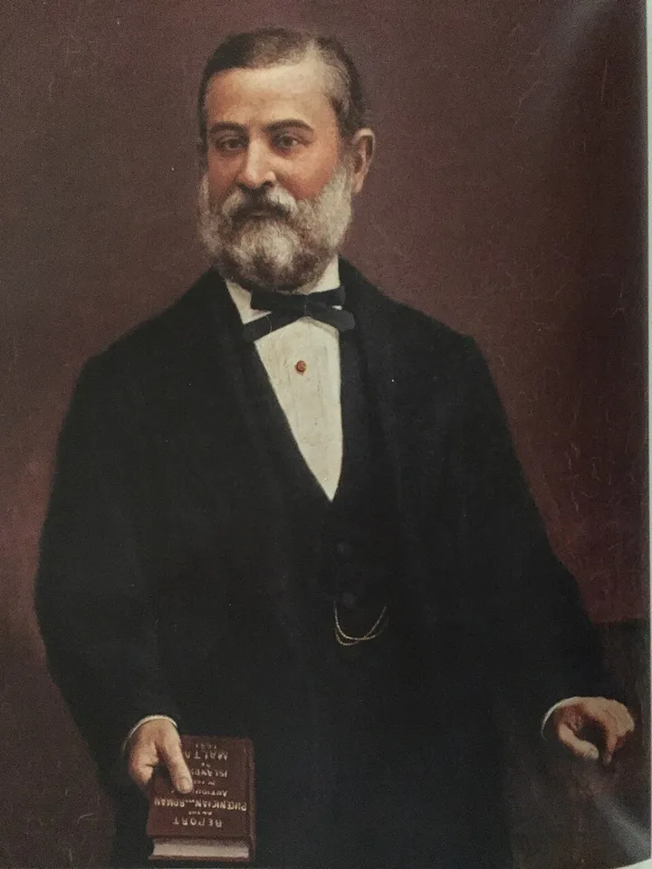 Ritratt ta’ Antonio Annetto Caruana bir-rapport tiegħu f’idejh.